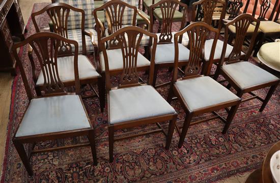 A set of eight George III style mahogany dining chairs